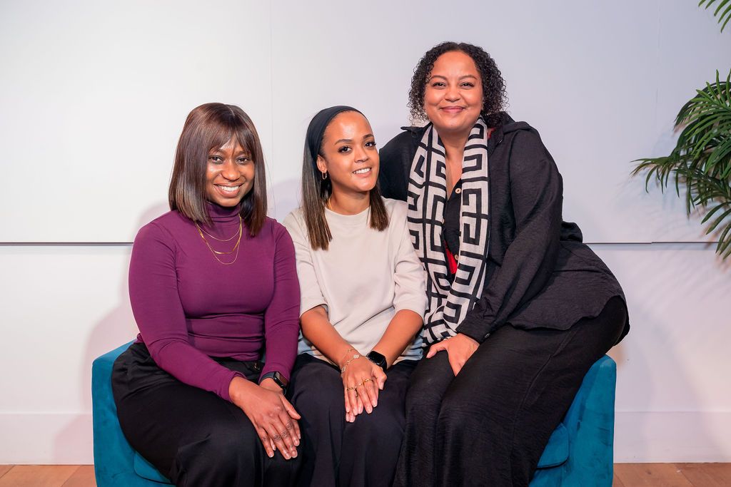Three members on a sofa at the Unify Social 2026